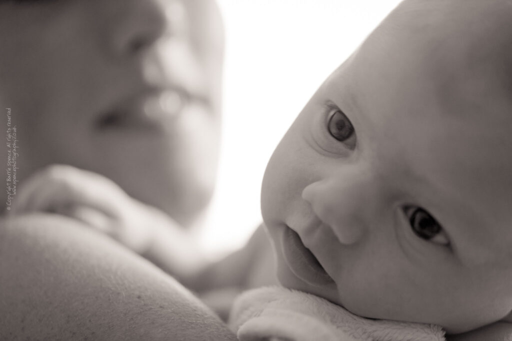 Baby Ruby Baby Ruby on Leona's shoulder (black & white) / © Copyright 2011 Barrie Spence. All rights reserved.